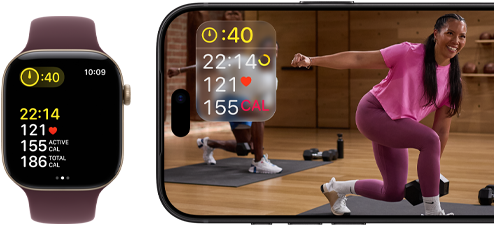 Apple Watch obok iPhone’a z treningiem Apple Fitness+ wyświetlonym na ekranie