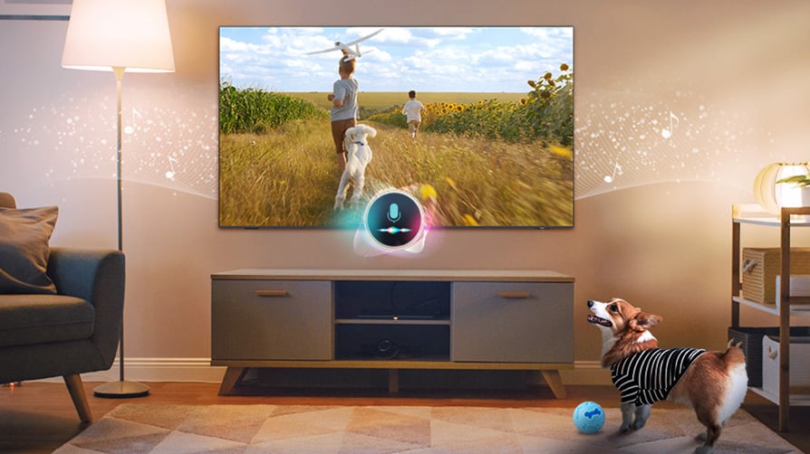 Pies szczeka w salonie. Mikrofon podłączony do Samsung Mini LED Neo QLED rozpoznaje dźwięk dzięki AI i informuje właściciela. Można ustawić automatyczne odtwarzanie ulubionych filmów lub muzyki dla zwierzaka.